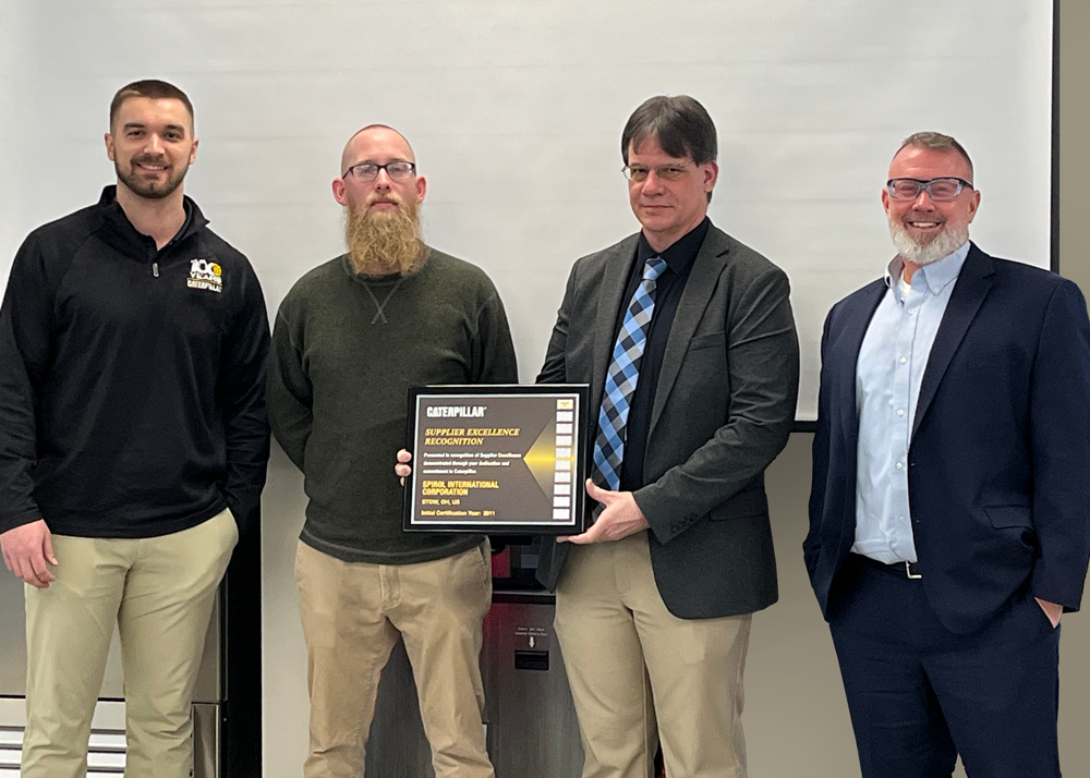 From left: Keaton Rice (Policy Buyer, Caterpillar), Michael Herder (Supplier Development Engineer, Caterpillar), David Reisinger (Key Account Manager, SPIROL Shim Corp), and Ken Hagan (President / Group COO, SPIROL Precision Products Division)